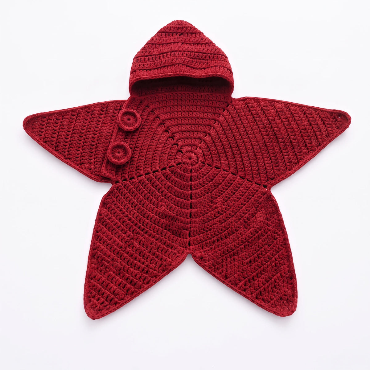 The Red Little Starfish knit romper laid flat, showing the hood, two buttons and all five points